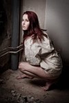 10291371-an-insane-psycho-girl-wearing-a-straight-jacket.jpg