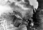 Red_army_soldiers_raising_the_soviet_flag_on_the_roof_of_the_reichstag_berlin_germany.jpg