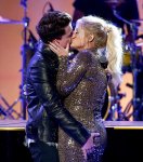 meghan-trainor-charlie-puth-kiss-make-out-amas-performance-2015-billboard-500.jpg