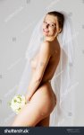 stock-photo-beautiful-nude-bride-in-wedding-veil-571564321.jpg