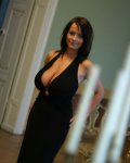 NonNudeBigTitsLadyInBlackDress.jpg